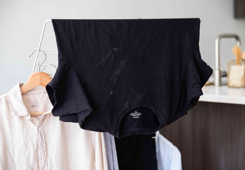What Causes White Residue on Washed Clothes?